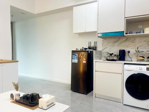 Kuchyň nebo kuchyňský kout v ubytování HG Bay Premier Suites