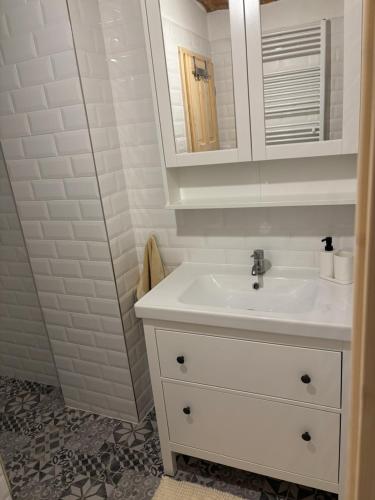 Phòng tắm tại Apartment Polubny