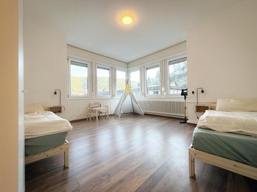 Postel nebo postele na pokoji v ubytování Familienzeit im Schwarzwald für 4 Pers mit Terasse