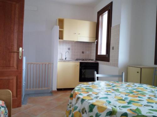 Apartment Olbia Holidays tesisinde mutfak veya mini mutfak