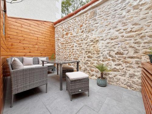 Khu vực ghế ngồi tại Maison proche centre-ville et Futuroscope