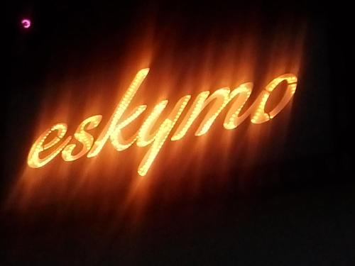 a lit up sign that says exaltion at Chata Eskymo in Staré Město