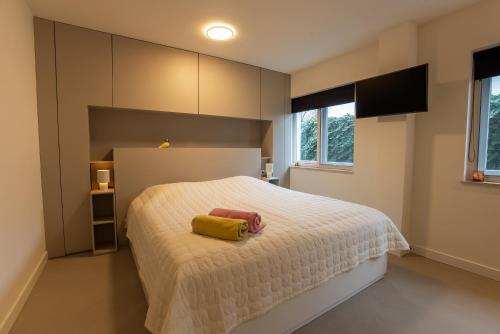 En eller flere senge i et værelse på De Duindoorn