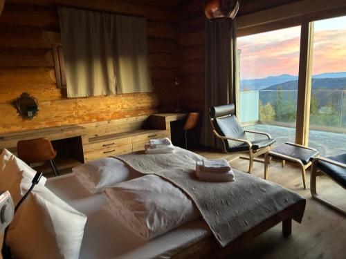 Postel nebo postele na pokoji v ubytování KlippitzStar mit Panoramablick