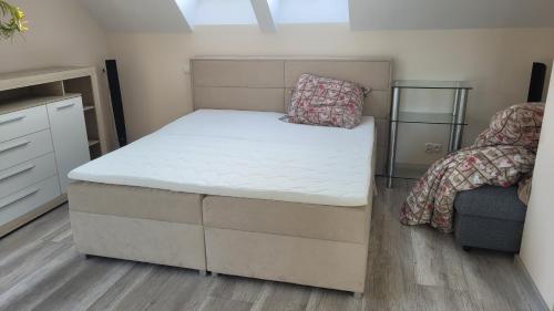 En eller flere senge i et værelse på Sulidom