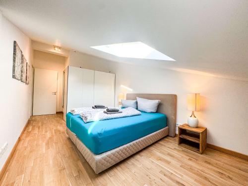 Postel nebo postele na pokoji v ubytování Eiswerder - Inselwohnung in der Havel mit Balkon