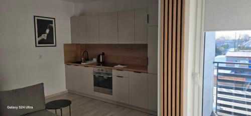 Een keuken of kitchenette bij Studio Człuchów Centrum