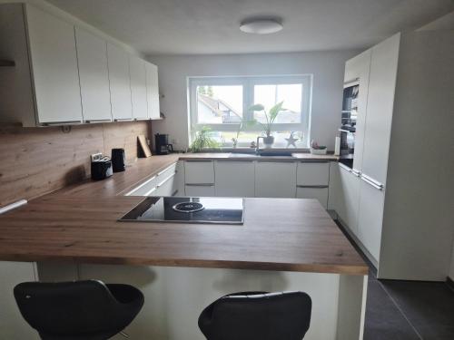 Kuchyň nebo kuchyňský kout v ubytování Ferienhaus Valle Verde in Kall-Steinfeld