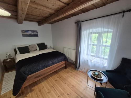 Giường trong phòng chung tại NeuHaus Apartman