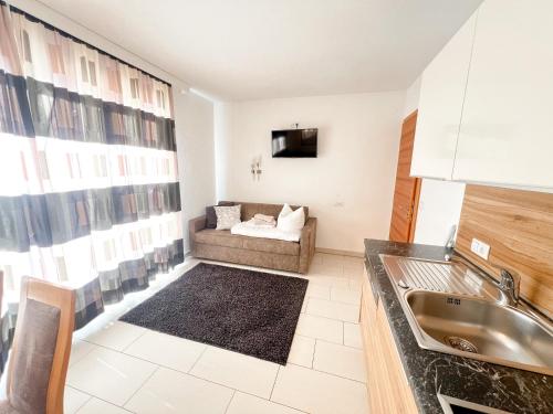 Et tv og/eller underholdning på Appartements Platzl