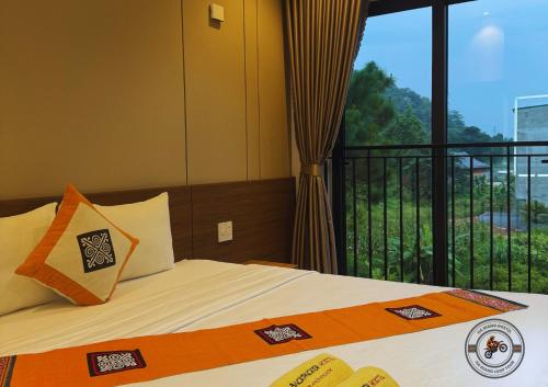 Giường trong phòng chung tại Ha Giang Hostel