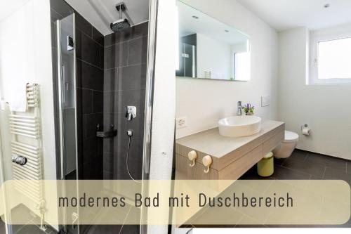 Et badeværelse på Jasminkas Host 3 - Stadtwohnung mit Küche & gratis Parkplatz