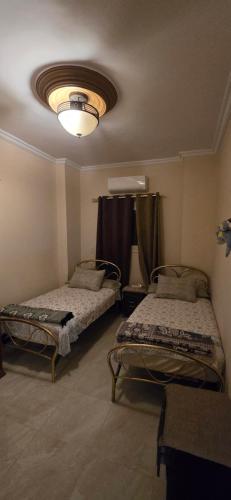 En eller flere senge i et værelse på Marsiamo