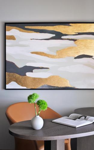 a picture of a table with two plants on it at Kimpton KAFD Riyadh by IHG in Riyadh