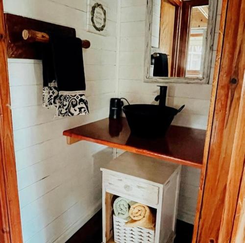 a kitchen with a counter and a sink in a room at Lodge Parana Ranch in Ituzaingó