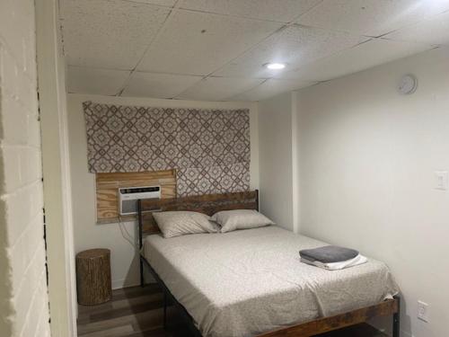 a bedroom with a bed in a room at St Pete Room hub in St. Petersburg