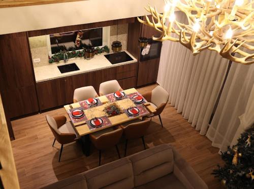 Posezení v ubytování De La Villa Brezovice