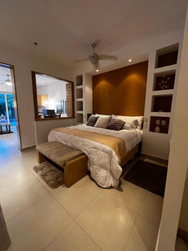 a large bedroom with a large bed and a window at PARADISE, in Taheima, Nuevo Vallarta in Nuevo Vallarta