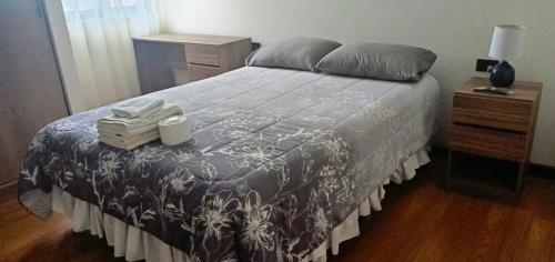 Llit o llits en una habitació de Garden CBBA