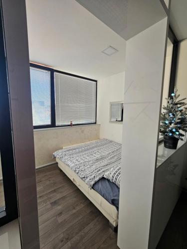 Postel nebo postele na pokoji v ubytování Ninche's Penthouse