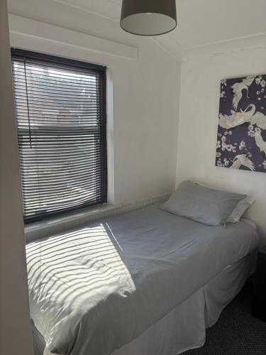 En eller flere senge i et værelse på Hockham