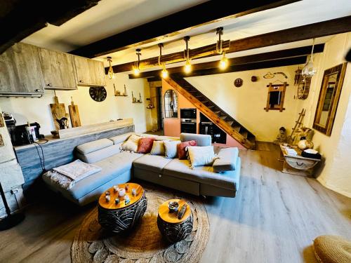 Khu vực ghế ngồi tại Maison de charme avec studio indépendant