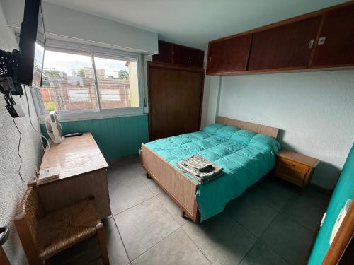 En eller flere senge i et værelse på A una cuadra de la playa con vista