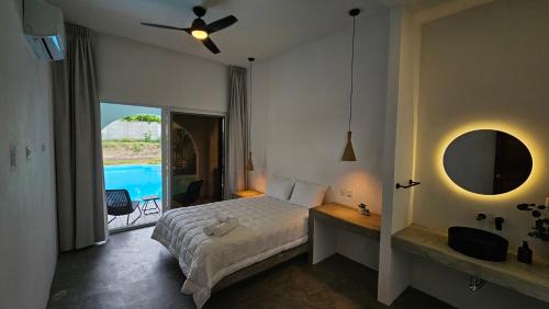 Postel nebo postele na pokoji v ubytování Casa Nahual