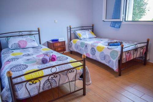 En eller flere senge i et værelse på Effie's Escape Spacious country house