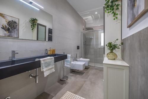 Koupelna v ubytování Appartamento Garden