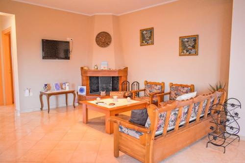 Et tv og/eller underholdning på Effie's Escape Spacious country house