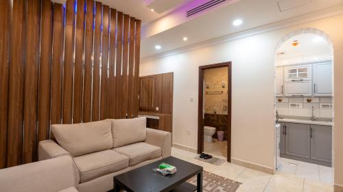 Kuchyň nebo kuchyňský kout v ubytování شقق المتألق الحديثة الفندقية