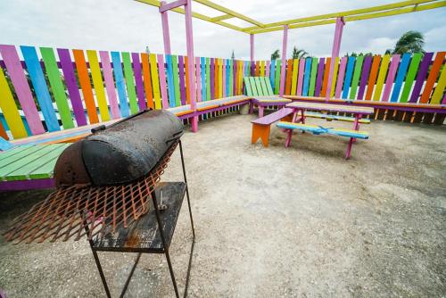 Photo de la galerie de l'établissement Travellers Palm Backpackers, à Caye Caulker