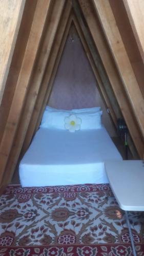 Llit o llits en una habitació de Cabaña Nicas