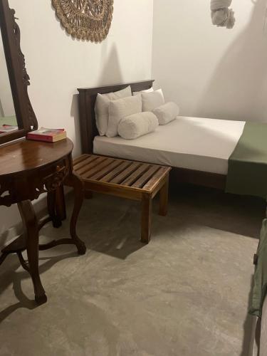 Un ou plusieurs lits dans un hébergement de l'établissement Royal Resort