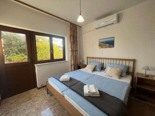 Uma cama ou camas num quarto em Holiday Sun Accommodations