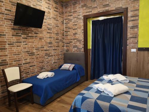 Postel nebo postele na pokoji v ubytování Marina Club