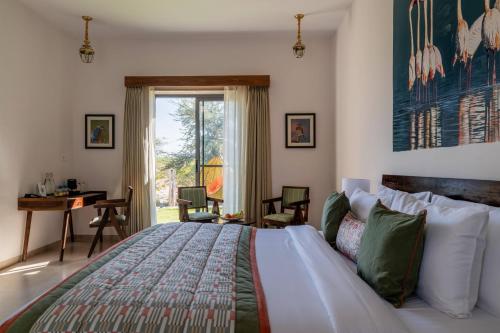 Postel nebo postele na pokoji v ubytování jüSTa Luxé - Highpoint Jawai