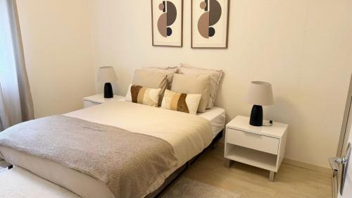 En eller flere senge i et værelse på Superbe T2 avec Terrasse Tout équipé