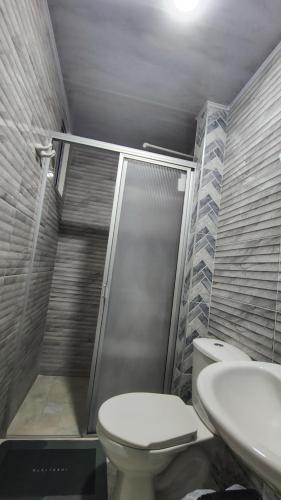 Et badeværelse på Hospedaje Luz de Cite