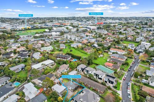 an aerial view of a suburb with houses at Holiday House in Central North Shore Auckland in Auckland