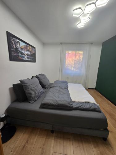 En eller flere senge i et værelse på Lake Loft Salzburg