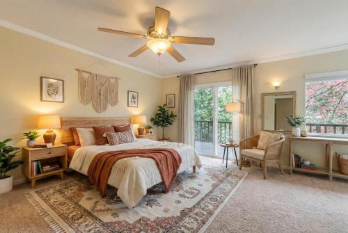 a bedroom with a bed and a ceiling fan at Gold rush nook in Grass Valley