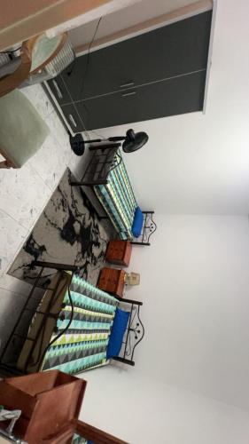 an overhead view of a room with chairs and a ceiling at Handala Guest House in Bethlehem