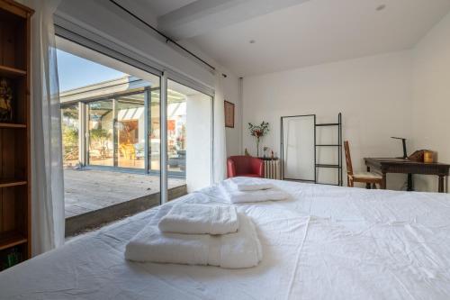 Postel nebo postele na pokoji v ubytování Le Plexus - Sérénité & relaxation - Villa 9 personnes