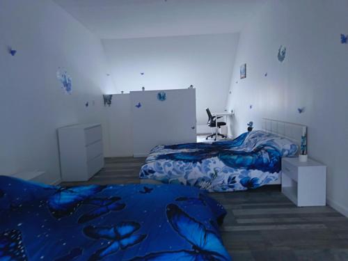 Postel nebo postele na pokoji v ubytování Village préféré des français ferrieres en Gâtinais