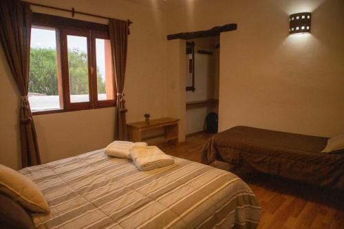 Postel nebo postele na pokoji v ubytování Rinconcito en Tilcara