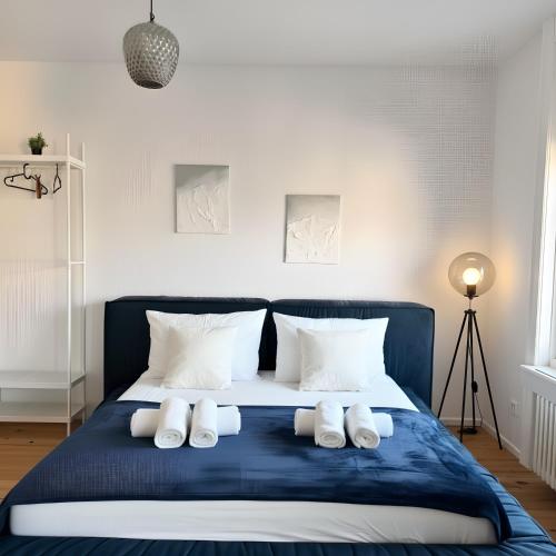 Postel nebo postele na pokoji v ubytování Apartment im Zentrum St Gallen