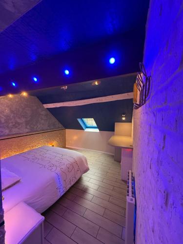 Giường trong phòng chung tại Au cœur de pont