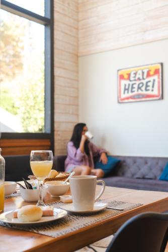 Et opholdsområde på Cabañas y Spa Costa Patagonia - Piscina Climatizada